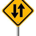 two way arrow road sign