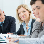 Businesspeople Discussing In Conference Room