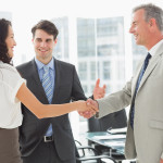 Businessman introducing colleagues in the office