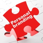 Marketing concept: Personal Branding on Red puzzle pieces background, 3d render